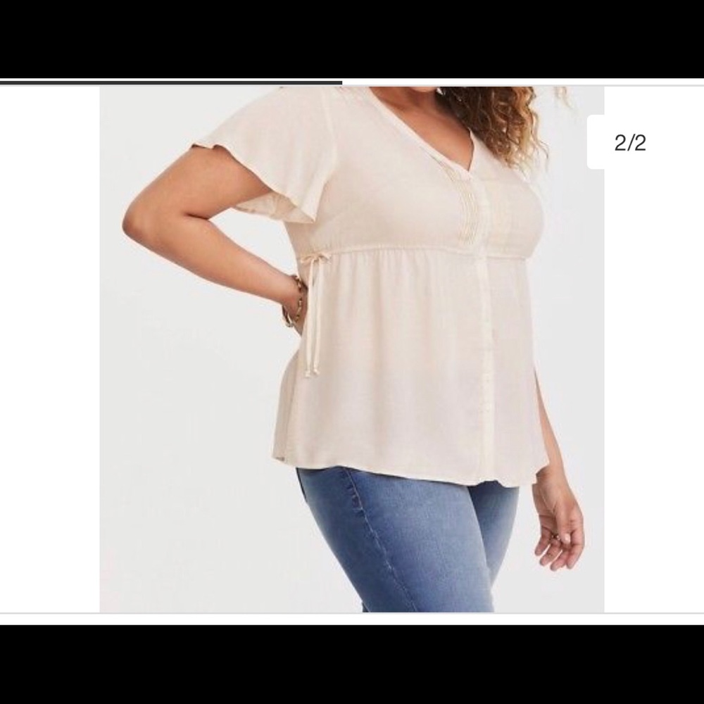 Cream short sleeve button down blouse